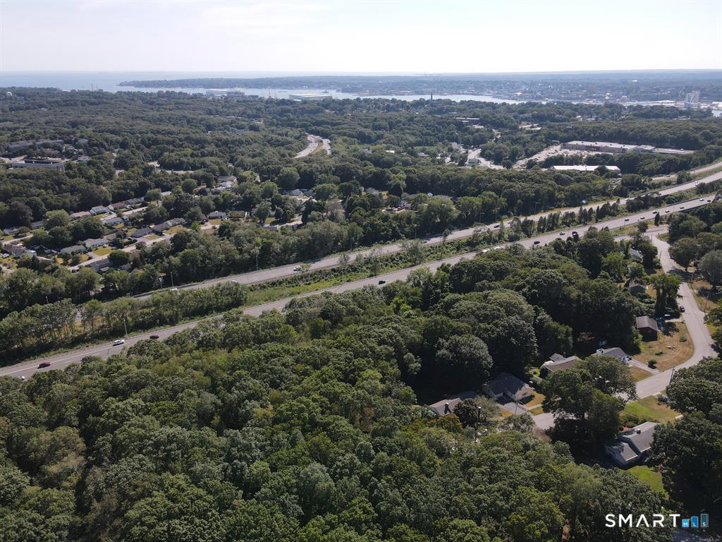 0 Bonnie Circle Groton, CT 06340 - Photo 11 of 13 an aerial view of residential house with green space and mountain view in back