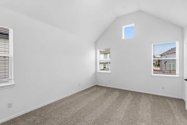 a bathroom with a bathtub sink and mirror