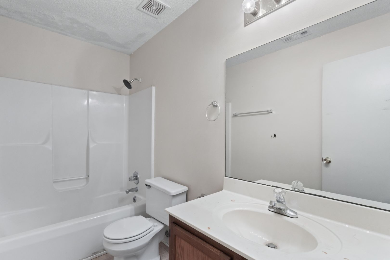 725 Peachers Mill Road Clarksville, TN 37042 - Photo 11 of 15 a bathroom with a sink toilet and shower