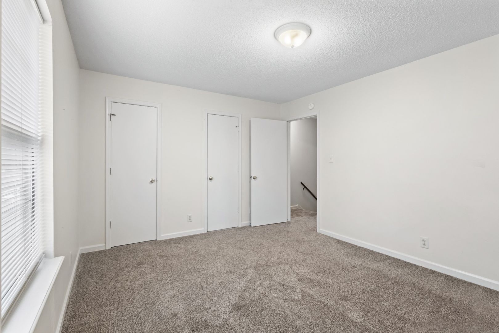 725 Peachers Mill Road Clarksville, TN 37042 - Photo 13 of 15 a view of an empty room and a window