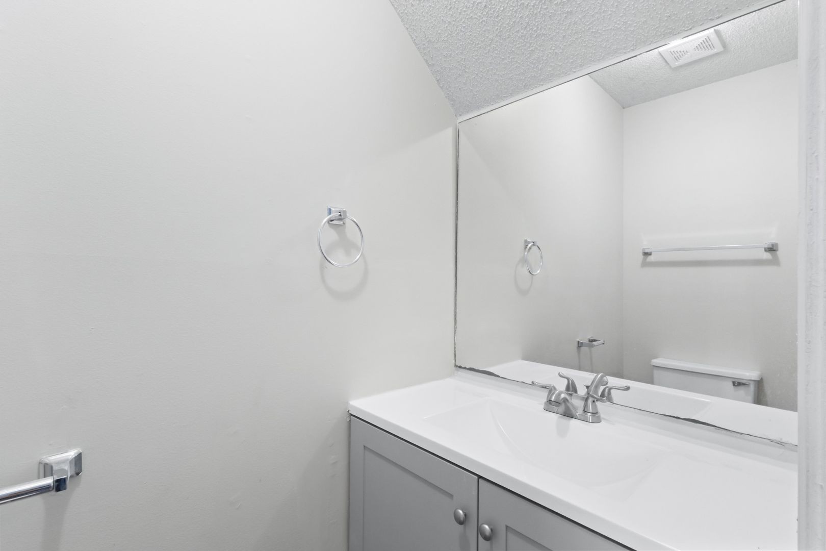 725 Peachers Mill Road Clarksville, TN 37042 - Photo 4 of 15 a bathroom with a sink and a mirror