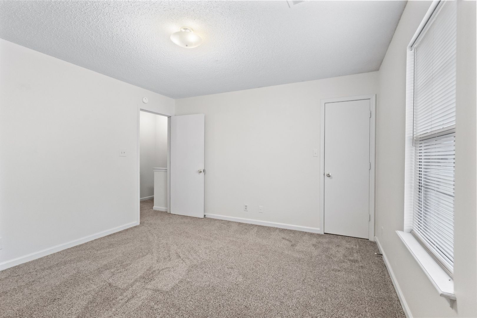 725 Peachers Mill Road Clarksville, TN 37042 - Photo 10 of 15 a view of an empty room and a window