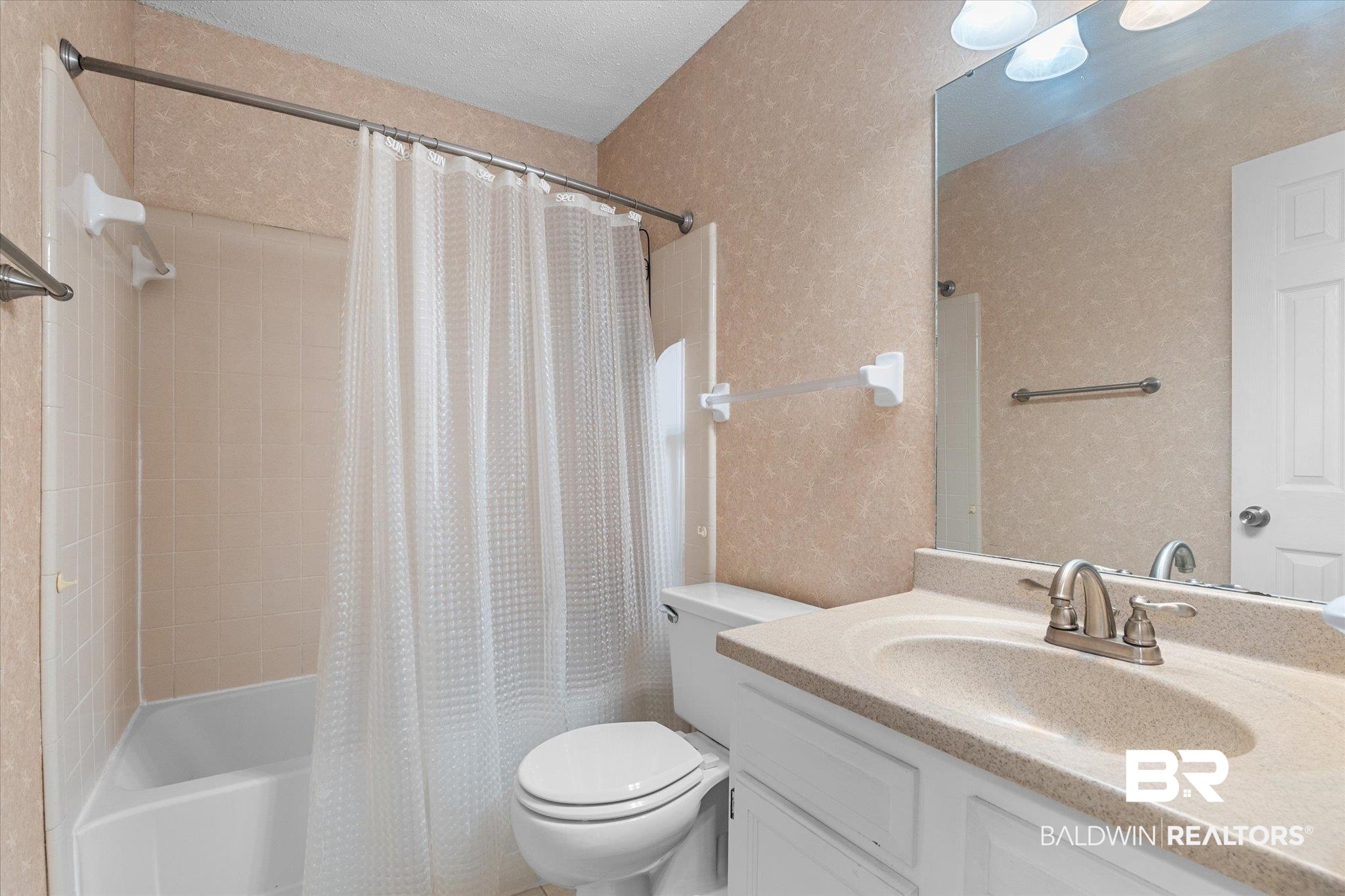 5645 Green Tree Road Mobile, AL 36609 - Photo 12 of 30 Full bathroom with toilet, shower / bath combo with shower curtain, and vanity