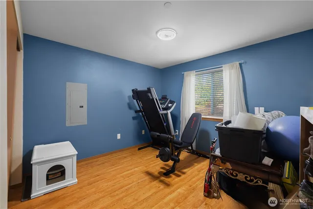 a workspace with furniture and a window