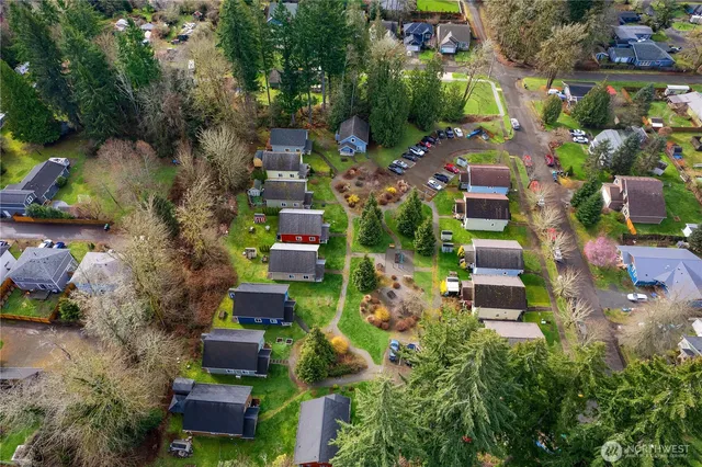 an aerial view of house with yard