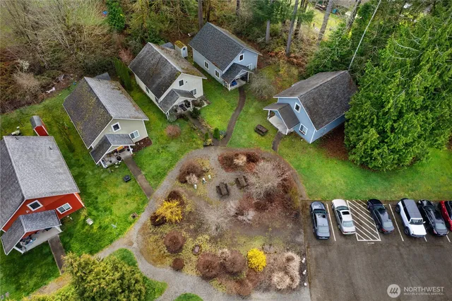 an aerial view of a house with outdoor space