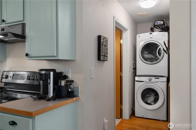 a view of storage and utility room with washer and dryer