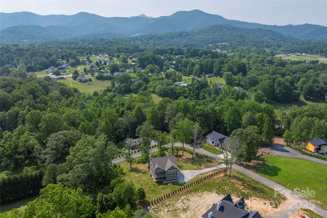 an aerial view of residential house with outdoor space