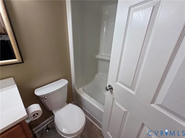 an empty room with closet area