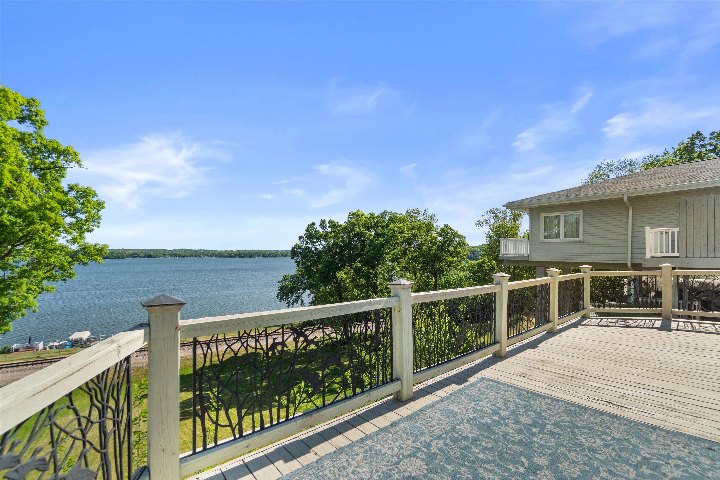 N39W27485 Hillside Grove Road Pewaukee, WI 53072 - Photo 26 of 43 Lake views from deck