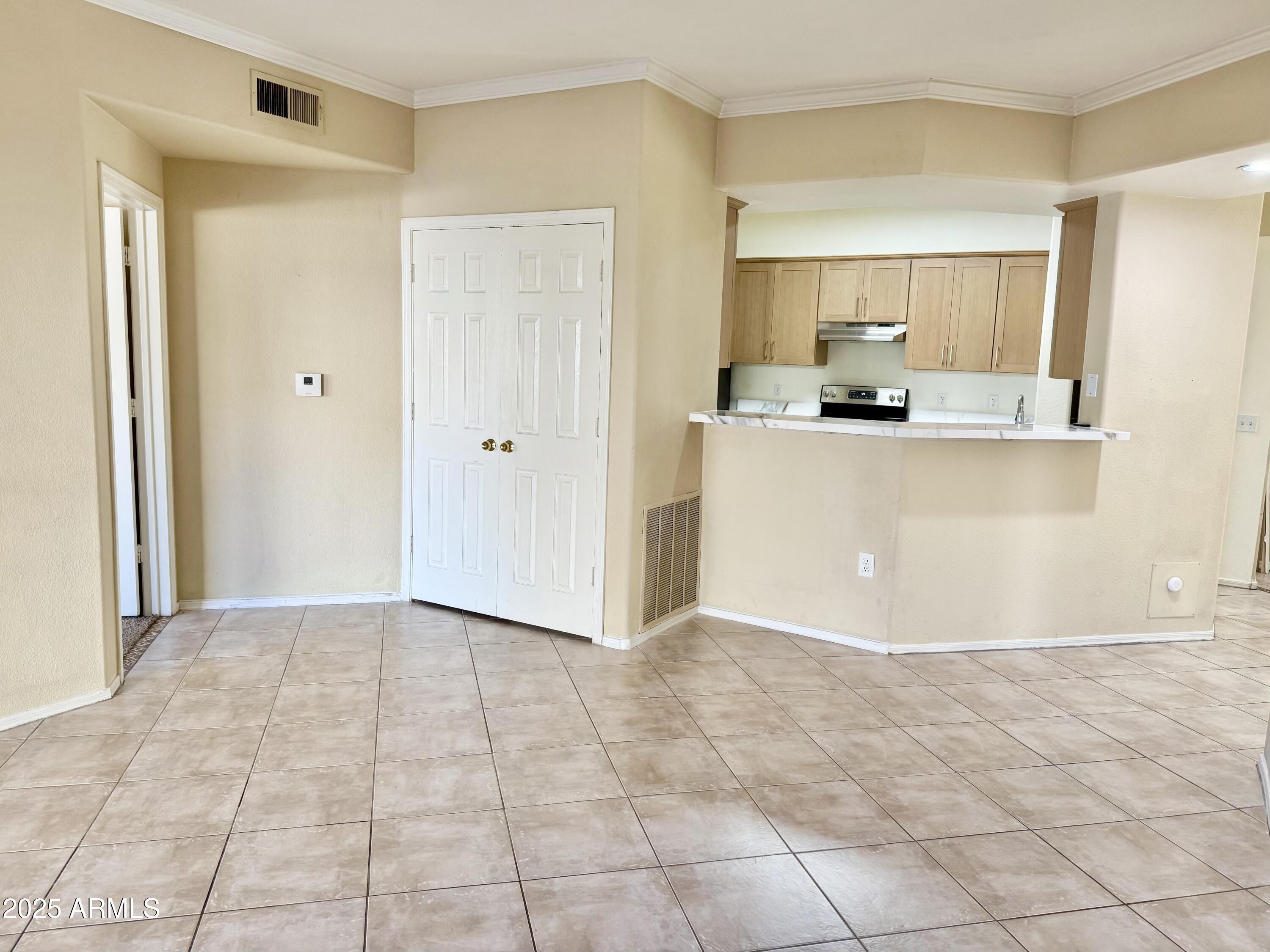 3236 East Chandler Boulevard, Unit 1071 Phoenix, AZ 85048 - Photo 11 of 35 a view of a kitchen with kitchen and a window