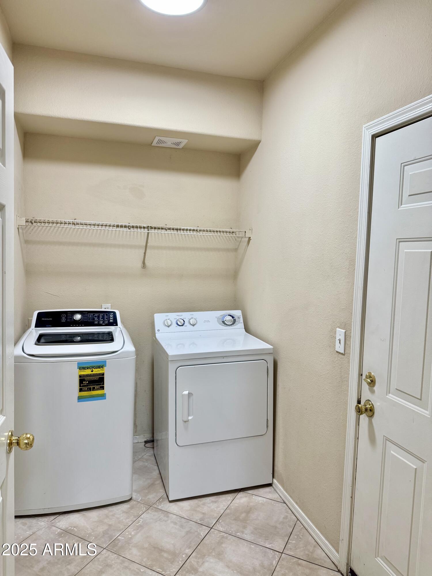 3236 East Chandler Boulevard, Unit 1071 Phoenix, AZ 85048 - Photo 16 of 35 a utility room with dryer and washer