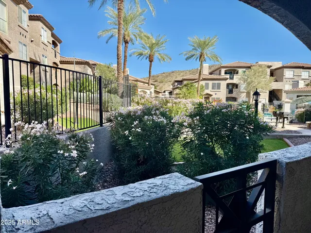a view of a house with a street