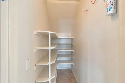 a view of small space with racks on the wall