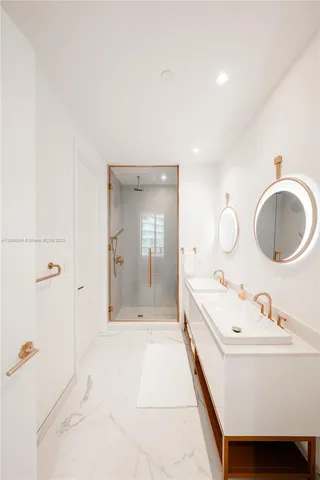 a view of a hallway with washer and dryer