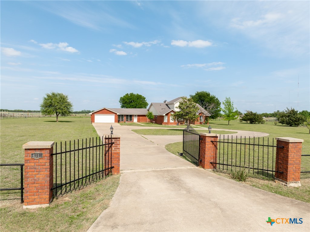 411 Wade Road Eddy, TX 76524 - Photo 3 of 48 a view of a wrought iron fences