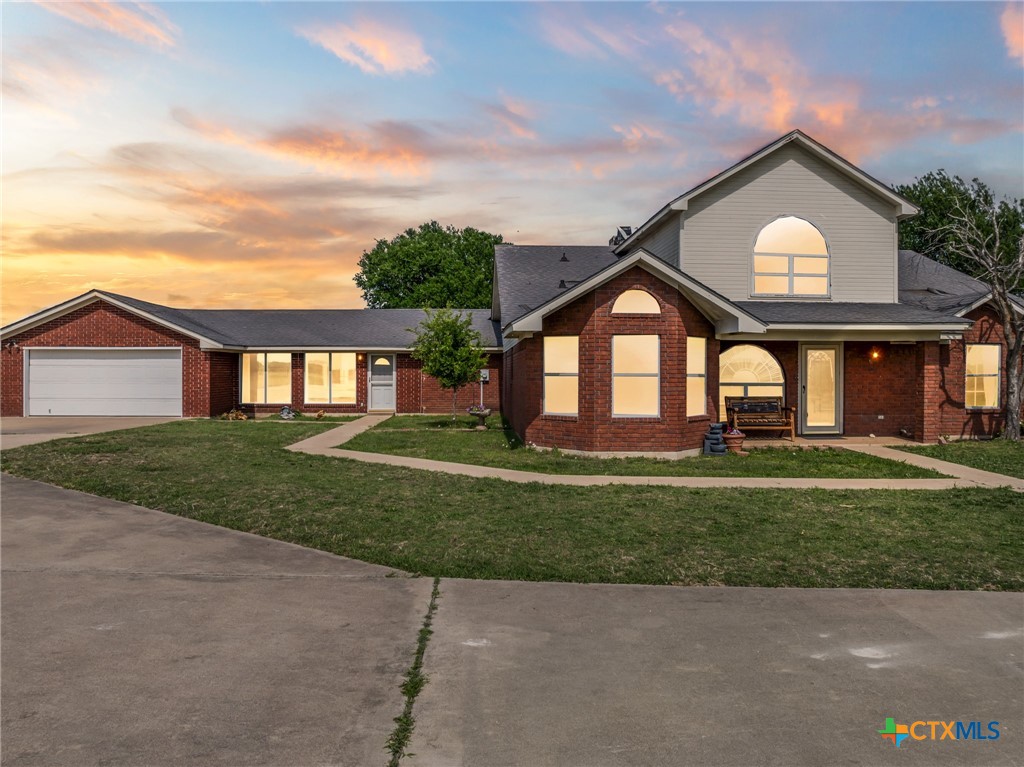 411 Wade Road Eddy, TX 76524 - Photo 4 of 48 a front view of a house with a yard