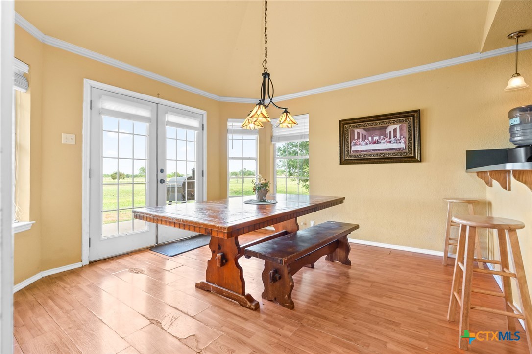 411 Wade Road Eddy, TX 76524 - Photo 42 of 48 a view of a room with furniture window and wooden floor