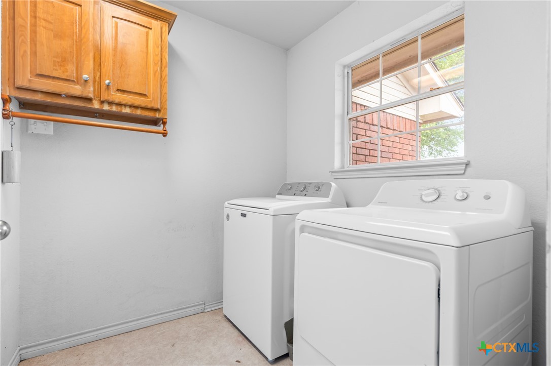 411 Wade Road Eddy, TX 76524 - Photo 43 of 48 a utility room with dryer and washer
