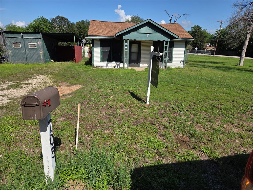 705 Mesquite Street Bryan, TX 77803 - Photo 1 of 9 a front view of a house with garden