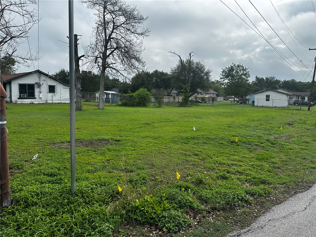 705 Mesquite Street Bryan, TX 77803 - Photo 6 of 9 a view of a house with a big yard