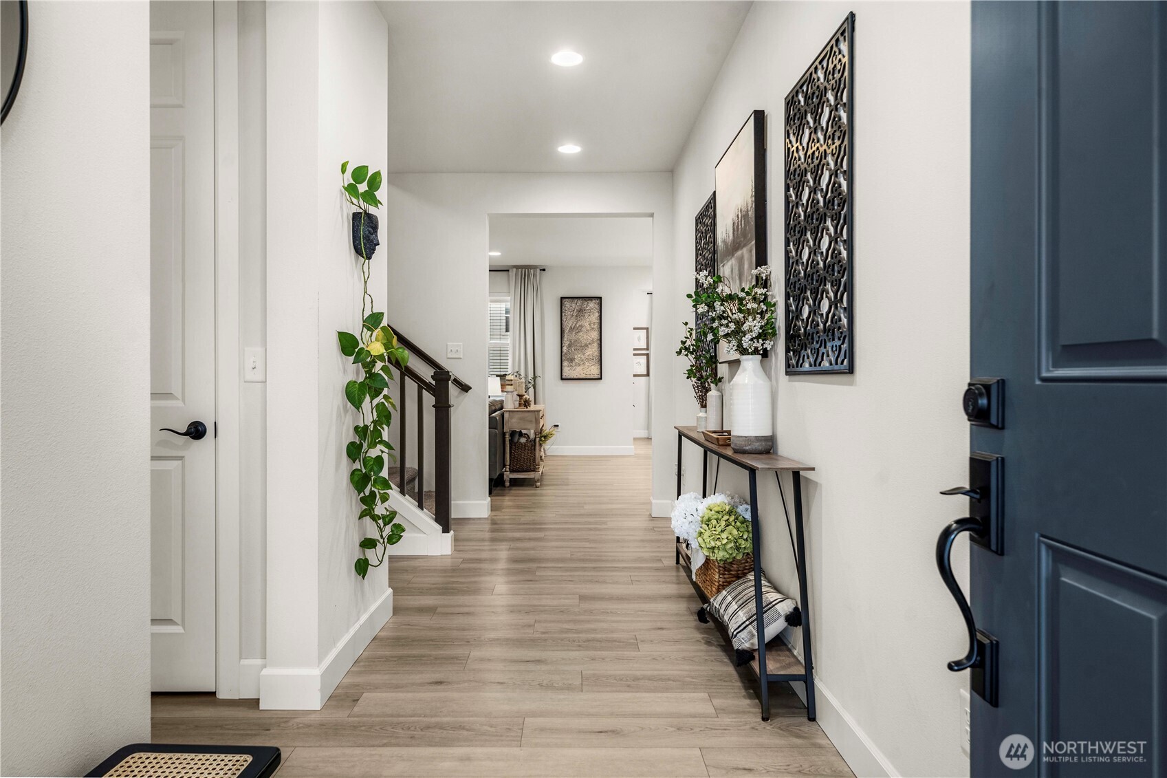 6209 Marymere Rd Port Orchard Southwest Port Orchard, WA 98367 - Photo 2 of 34 a hallway with wooden floor and stairs