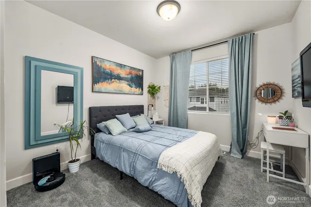 a view of a patio with couches table and chairs and potted plants