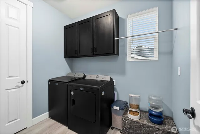 an aerial view of a house with a big yard