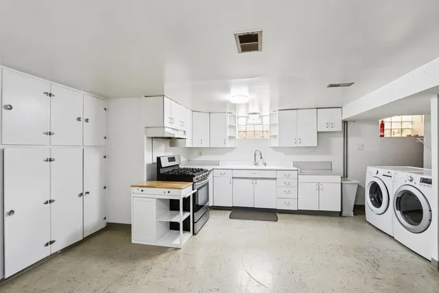 a view of kitchen and utility room