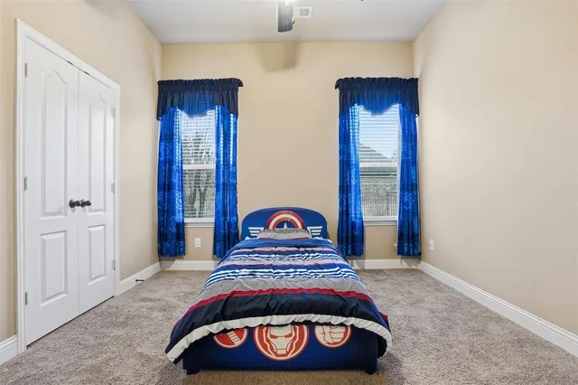 a bathroom with a toilet and a sink