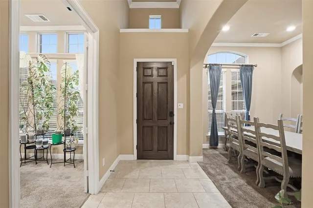 a view of a livingroom with furniture and windows