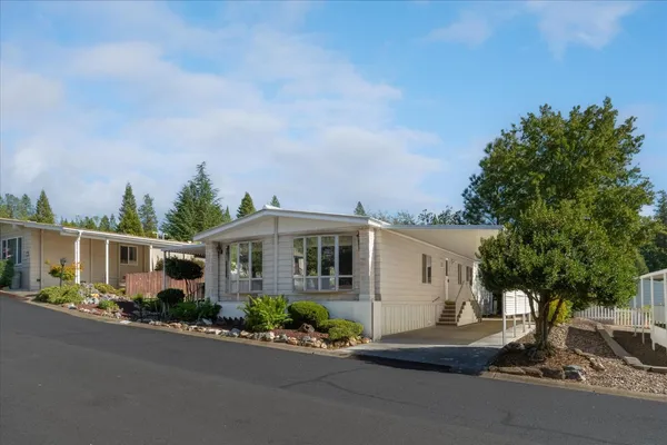 front view of a house with a street
