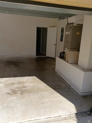 a kitchen with a cabinets a sink and a stove top oven