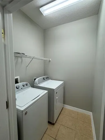 a bathroom with a sink a vanity and a mirror