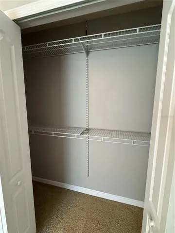 a bathroom with a bath tub with a shower
