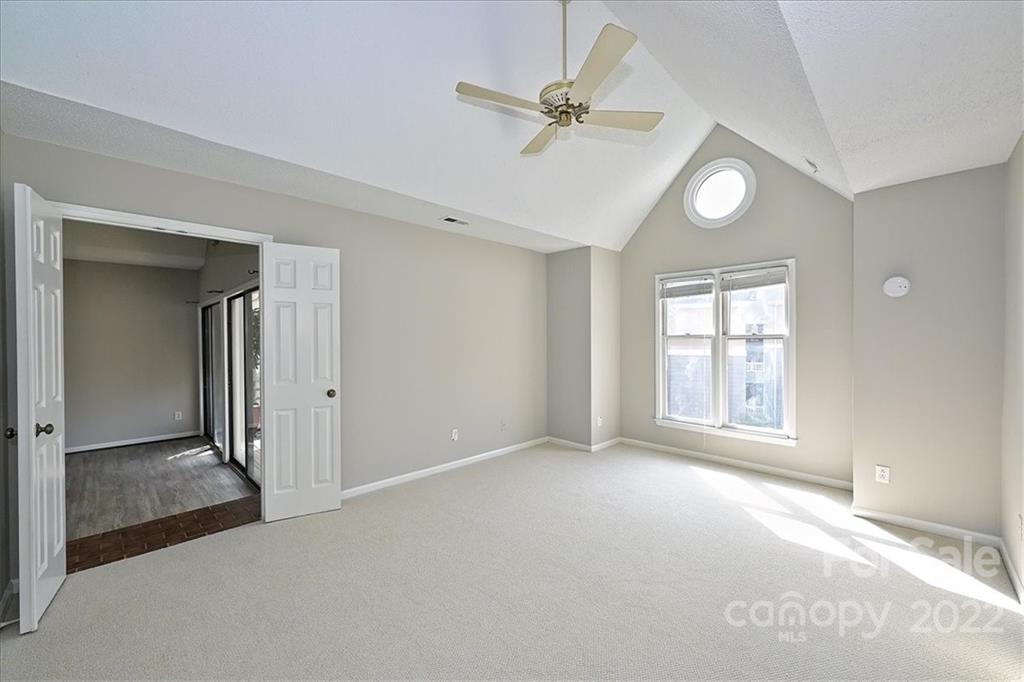 226 Queens Road, Unit 78 Charlotte, NC 28204 - Photo 21 of 32 a view of an empty room with a window