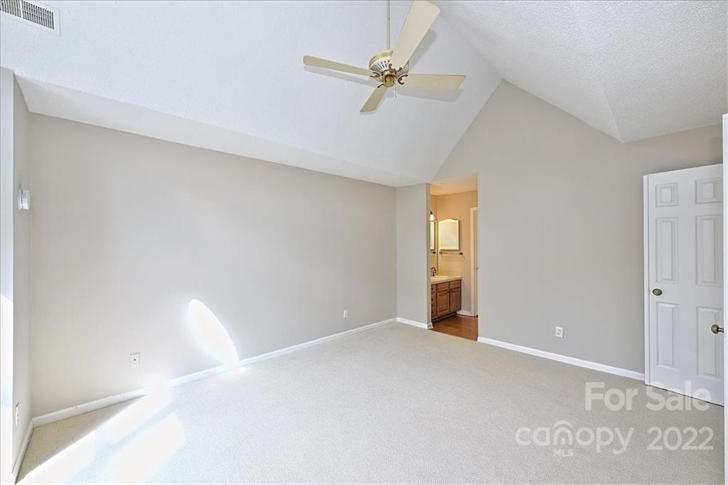 226 Queens Road, Unit 78 Charlotte, NC 28204 - Photo 22 of 32 a view of an empty room with a window