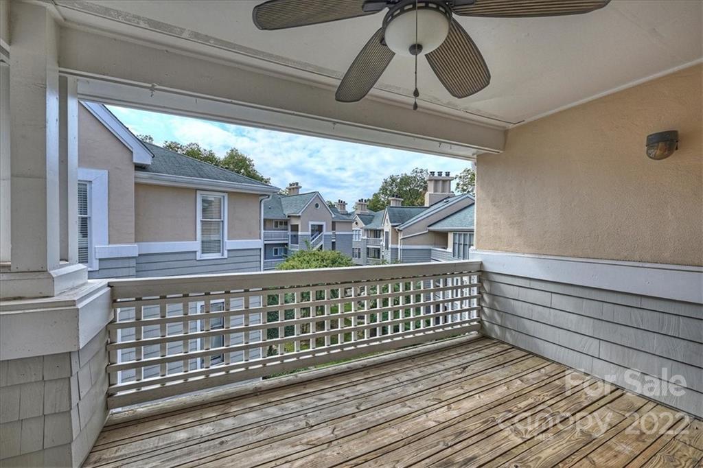 226 Queens Road, Unit 78 Charlotte, NC 28204 - Photo 31 of 32 a view of balcony with wooden floor