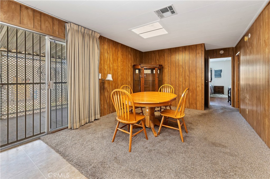 1630 Sonora Drive Hemet, CA 92543 - Photo 11 of 22 a dining room with furniture and window