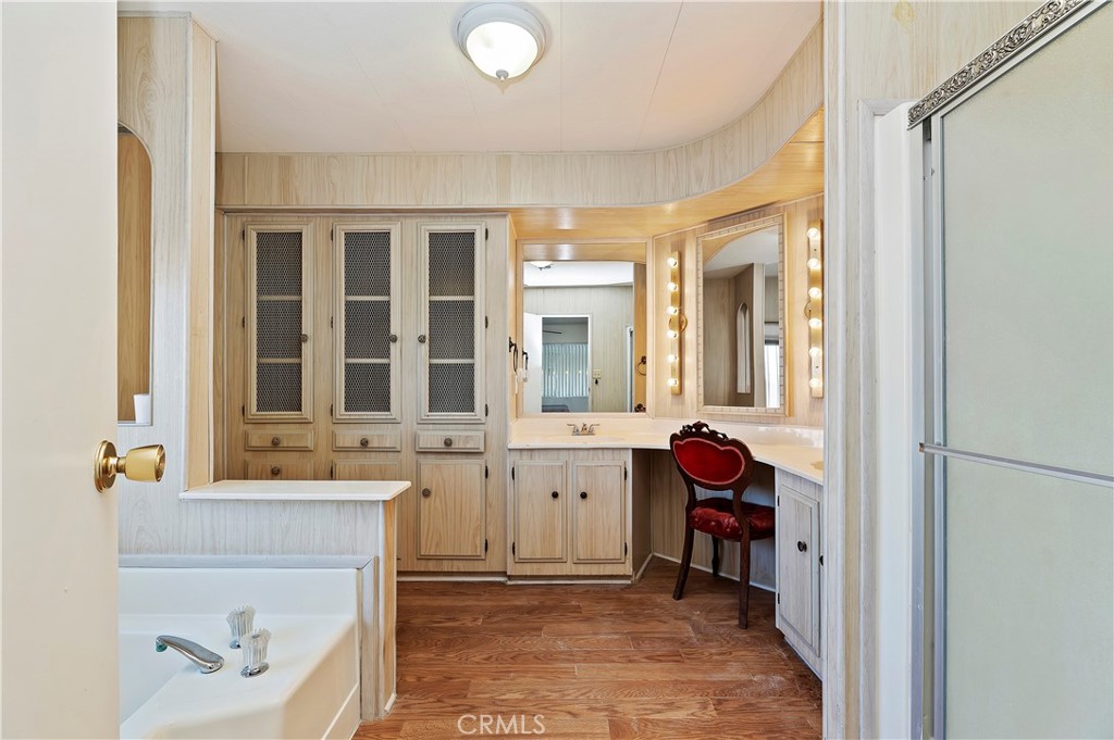 1630 Sonora Drive Hemet, CA 92543 - Photo 13 of 22 a spacious bathroom with a tub sink and mirror