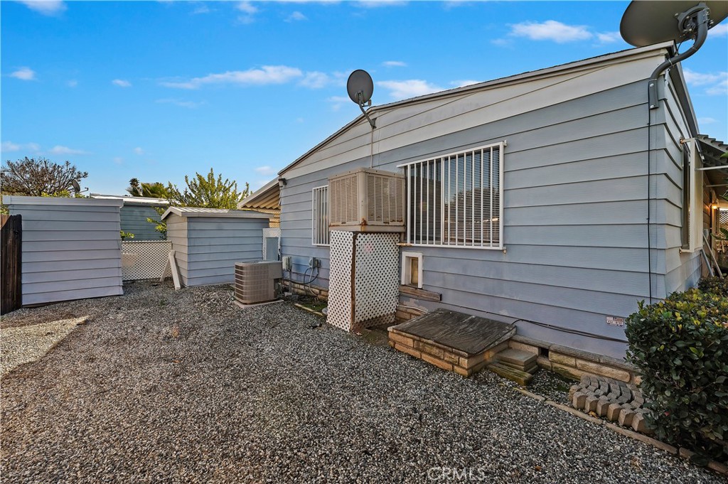 1630 Sonora Drive Hemet, CA 92543 - Photo 21 of 22 a view of a house with backyard and a tree