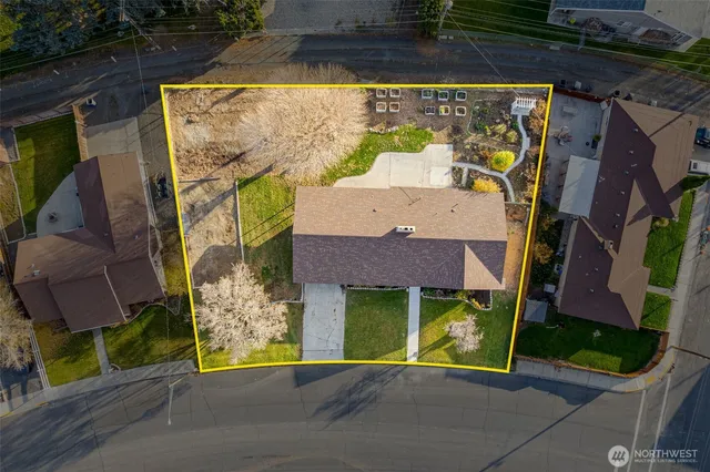 a view of a house with a porch and a floor to ceiling window