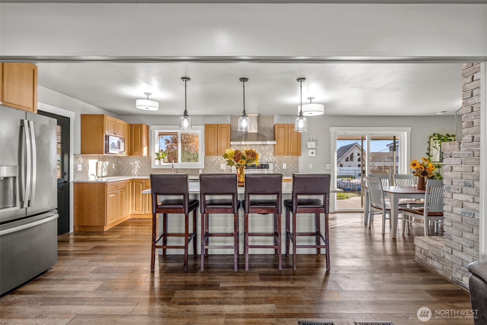 608 H Street Southeast Quincy, WA 98848 - Photo 8 of 32 a view of a dining room with furniture window and wooden floor