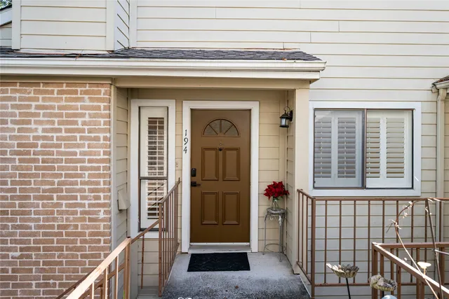 a front view of a house with a glass door