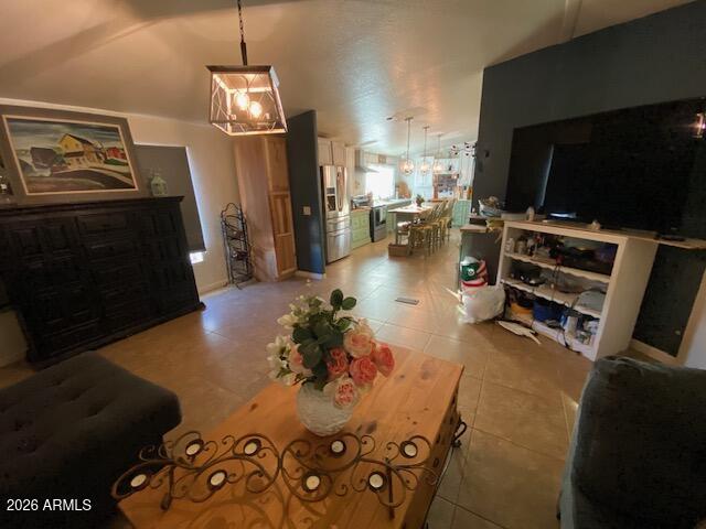 21301 West Dove Valley Road Wittmann, AZ 85361 - Photo 12 of 17 a view of a living room with furniture and a flat screen tv
