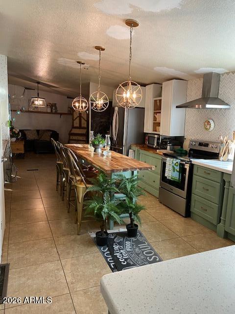 21301 West Dove Valley Road Wittmann, AZ 85361 - Photo 15 of 17 a kitchen with stainless steel appliances granite countertop a sink a stove and a wooden floors