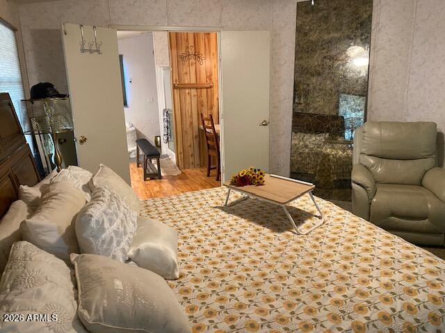 21301 West Dove Valley Road Wittmann, AZ 85361 - Photo 9 of 17 a bedroom with a bed a couch and dresser