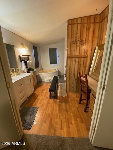 21301 West Dove Valley Road Wittmann, AZ 85361 - Photo 10 of 17 a bedroom with a bed and wooden floor