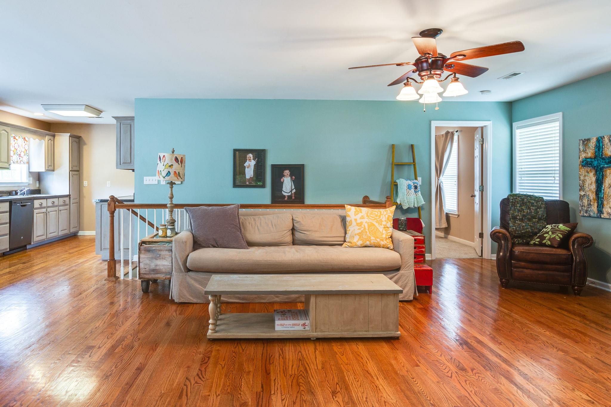 1675 Center Star Road Columbia, TN 38401 - Photo 11 of 21 a living room with furniture and a wooden floor
