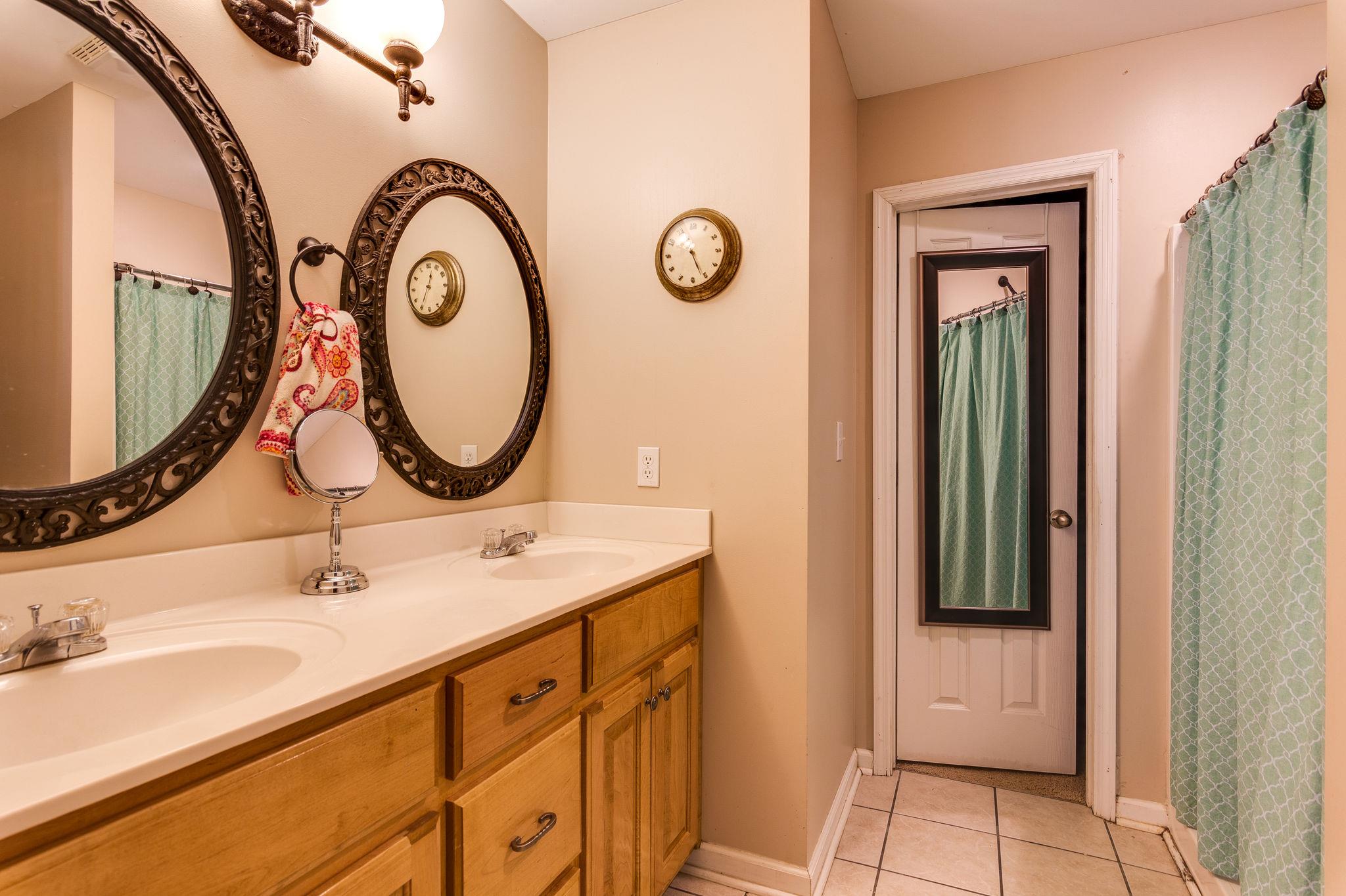 1675 Center Star Road Columbia, TN 38401 - Photo 16 of 21 a bathroom with a sink and a mirror
